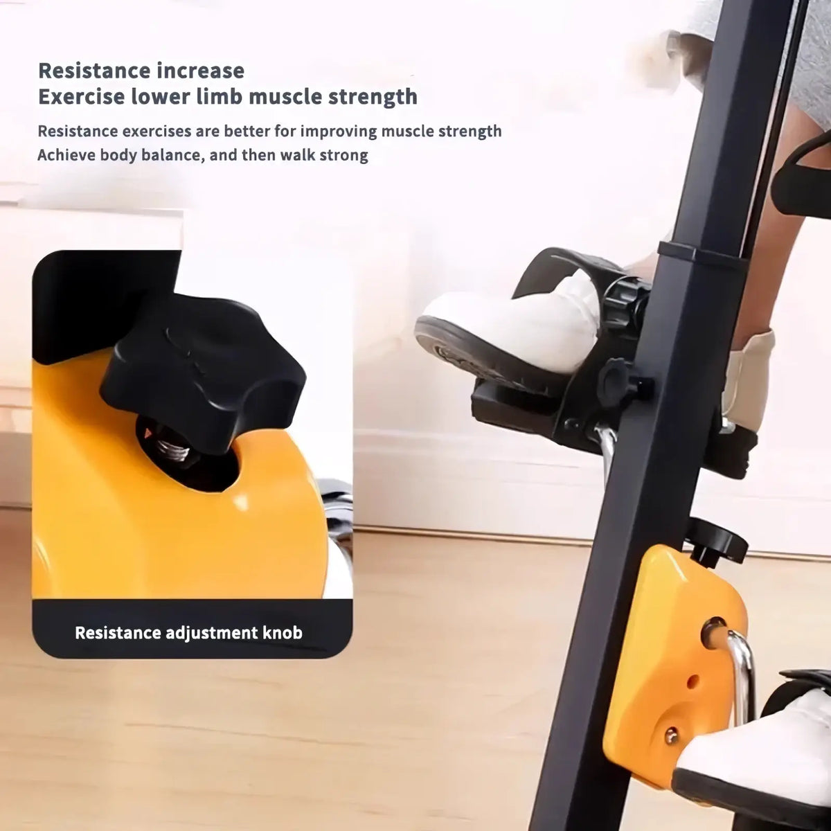 Mini exercise bike in yellow and black with adjustable resistance knob for upper and lower limb strength training