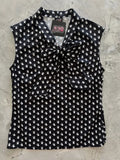 Black sleeveless blouse with white ghost pattern and tied bow neckline featuring Retro Lovers brand tag
