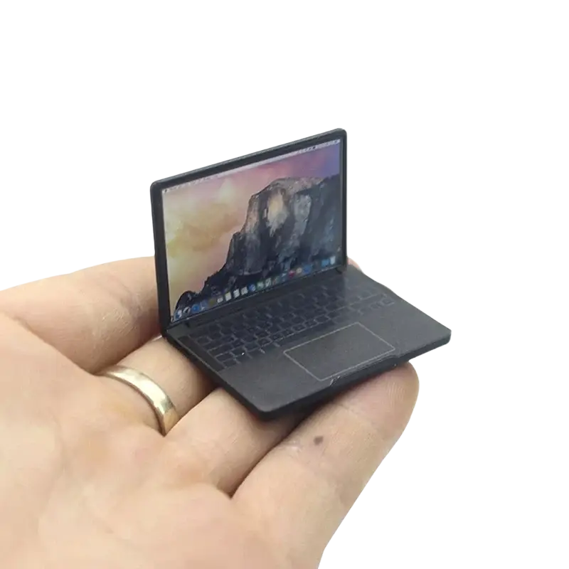 Black alloy mini laptop doll house accessory with detailed screen showing mountain landscape and authentic keyboard layout