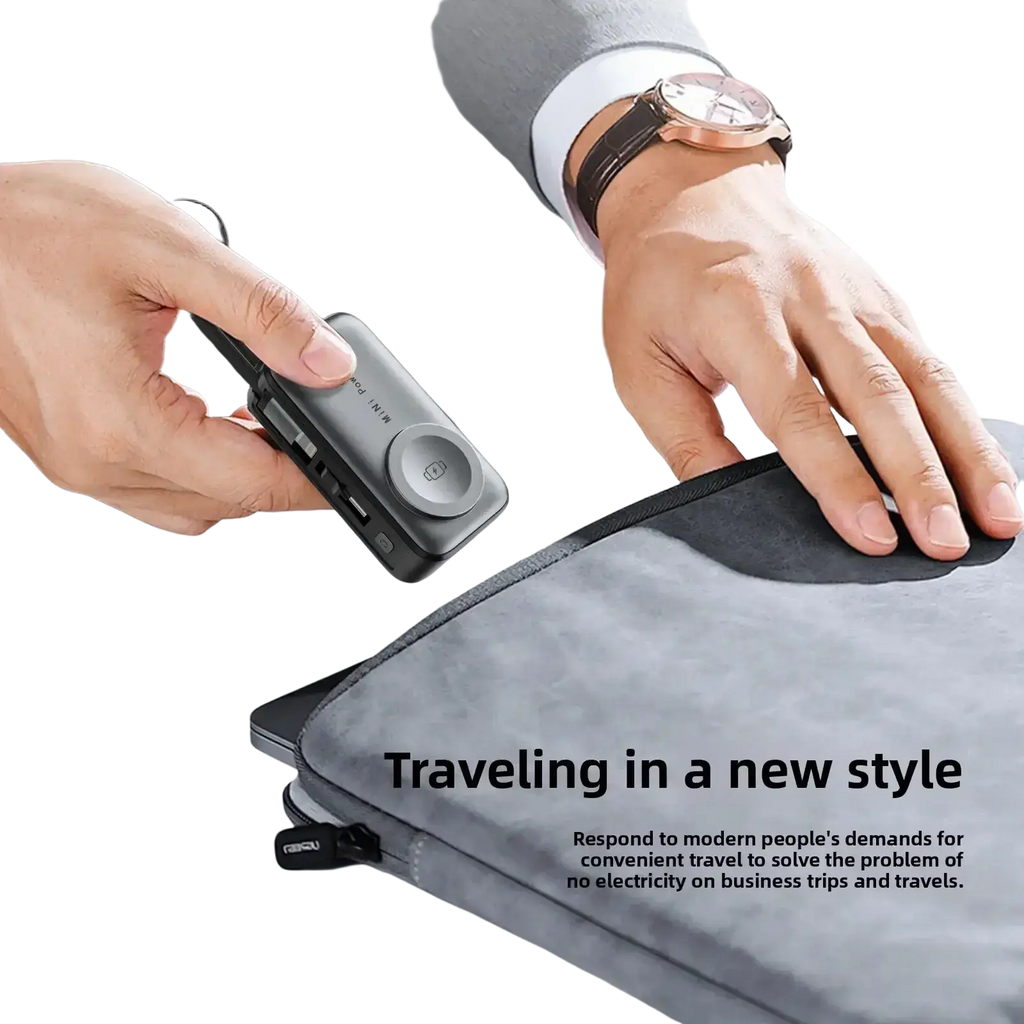 Black compact mini magnetic power bank 5000mah with multiple usb ports and a circular button on its side