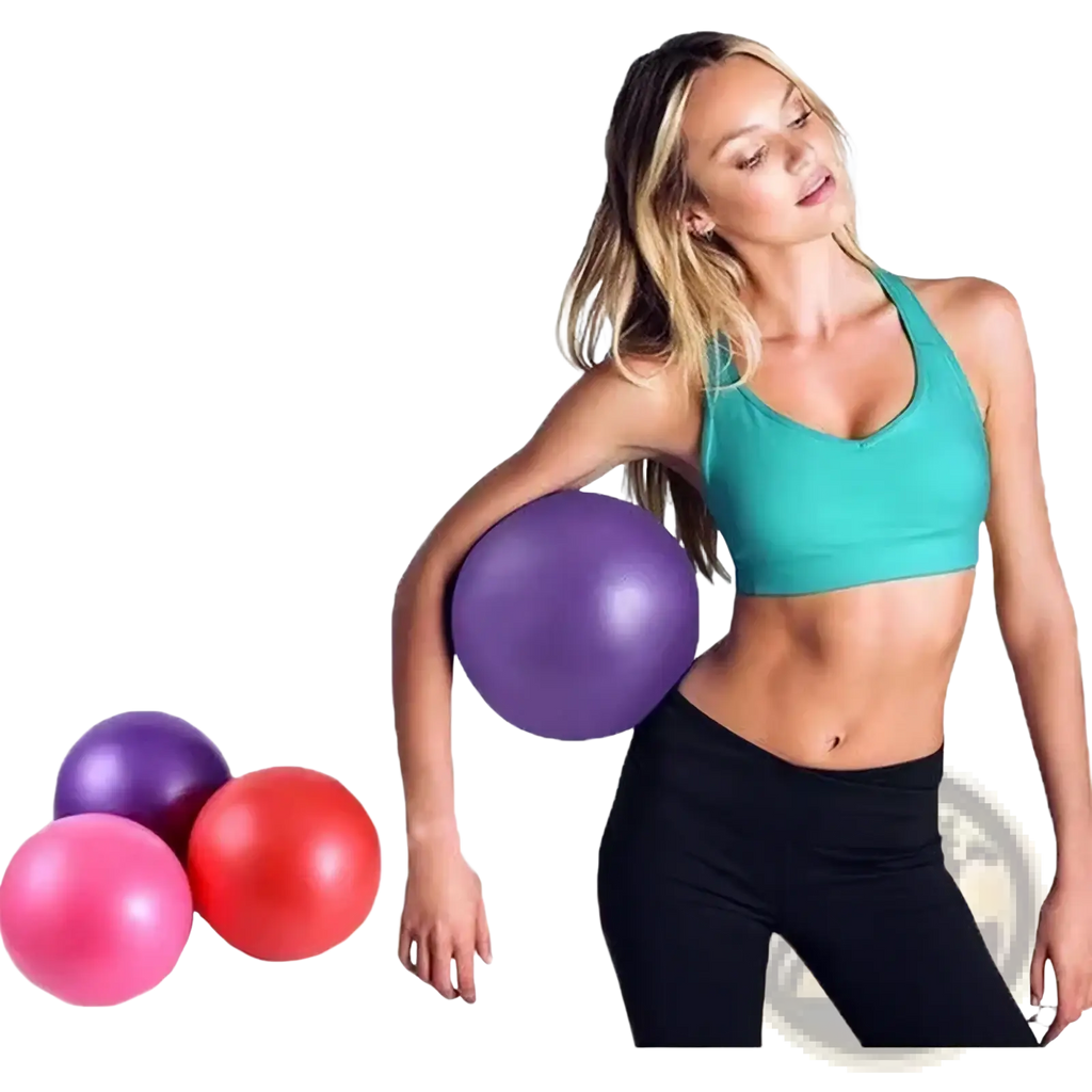 Woman in athletic wear holding a purple mini Pilates yoga ball for core fitness training and exercise