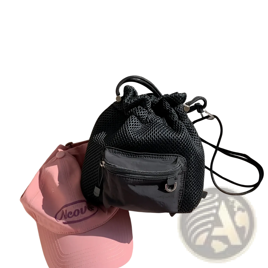 Black mesh drawstring backpack with front zippered pocket and adjustable strap matching mini pink mesh bucket bag design