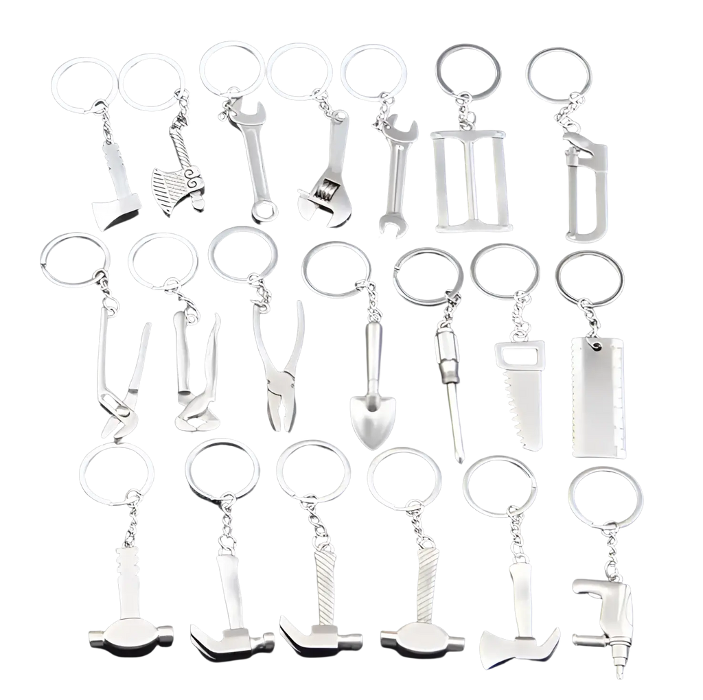 Set of silver-colored metal mini tool keychains featuring miniature axes wrenches hammers and saws on key rings