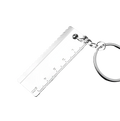 Silver metallic keychain ruler with serrated edge and engraved measurements in mini tool keychain set metal multi-tool