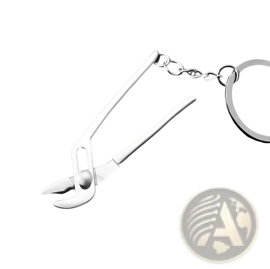 Silver-toned miniature pliers keychain with sleek metallic finish and chain attachment from mini tool keychain set metal multi-tool key ring