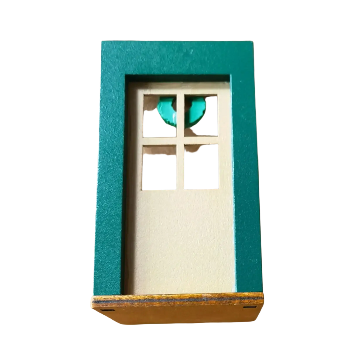 Miniature christmas door wall ornament with teal frame white panel and turquoise crescent moon cutout window