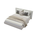 Modern miniature dollhouse double bed with cream tufted upholstered headboard and neutral bedding in platform style