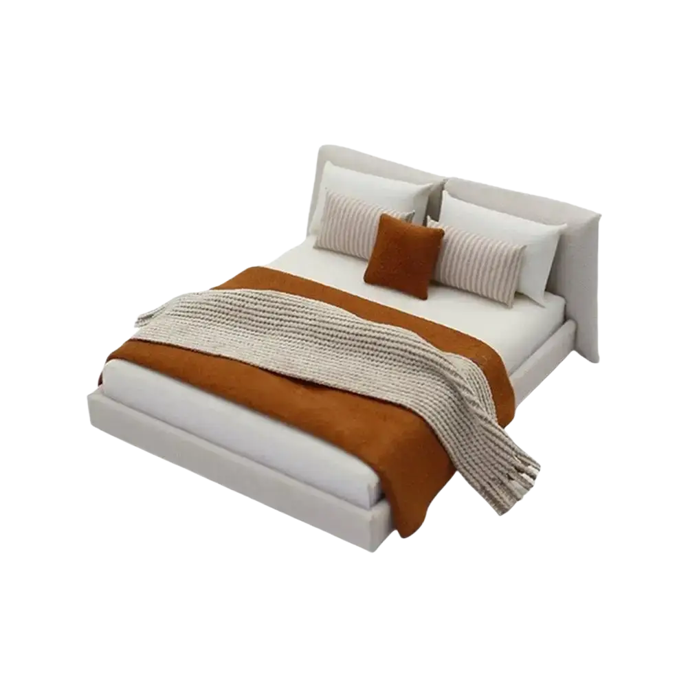 Miniature dollhouse double bed with cream tufted upholstered headboard, white linens, and terracotta throw accents