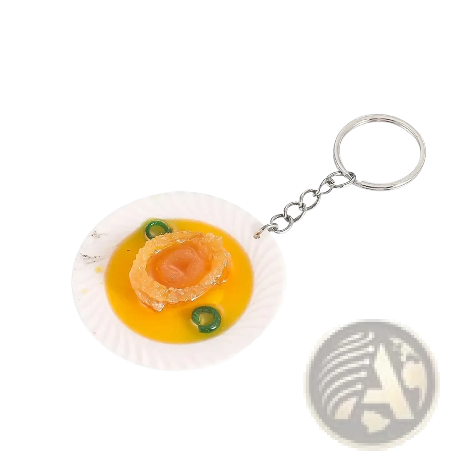 Miniature food keychain featuring a detailed abalone replica on a white paper plate with yellow sauce and garnish