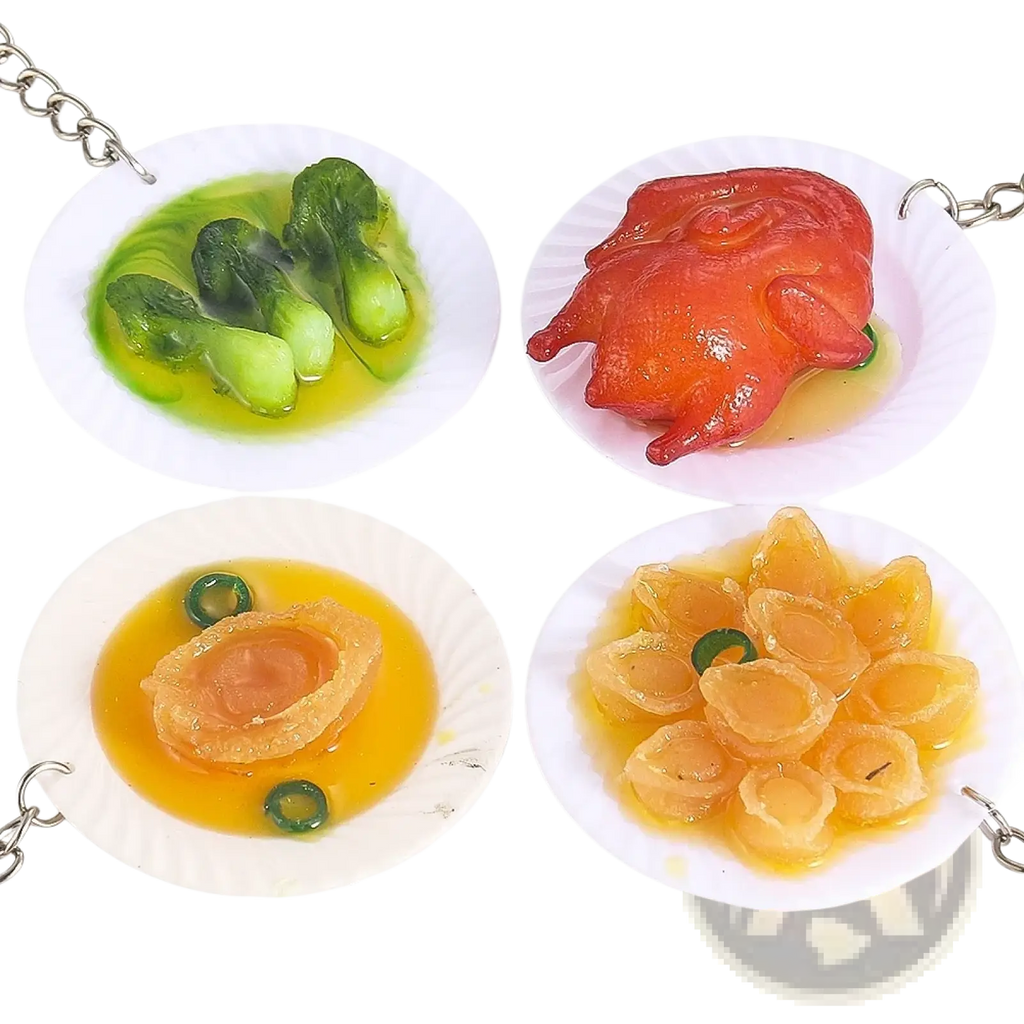 Miniature food keychain featuring a glossy realistic roasted chicken on a white plate with sauce simulation dish