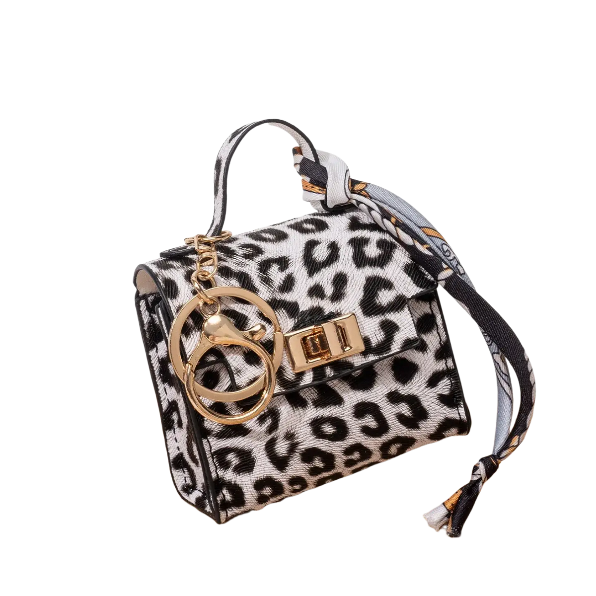 Miniature handbag keychain with black and white leopard print, gold-tone hardware, and a decorative silk scarf keychain