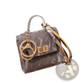 Gray textured miniature handbag keychain with gold-tone hardware and colorful striped silk scarf strap