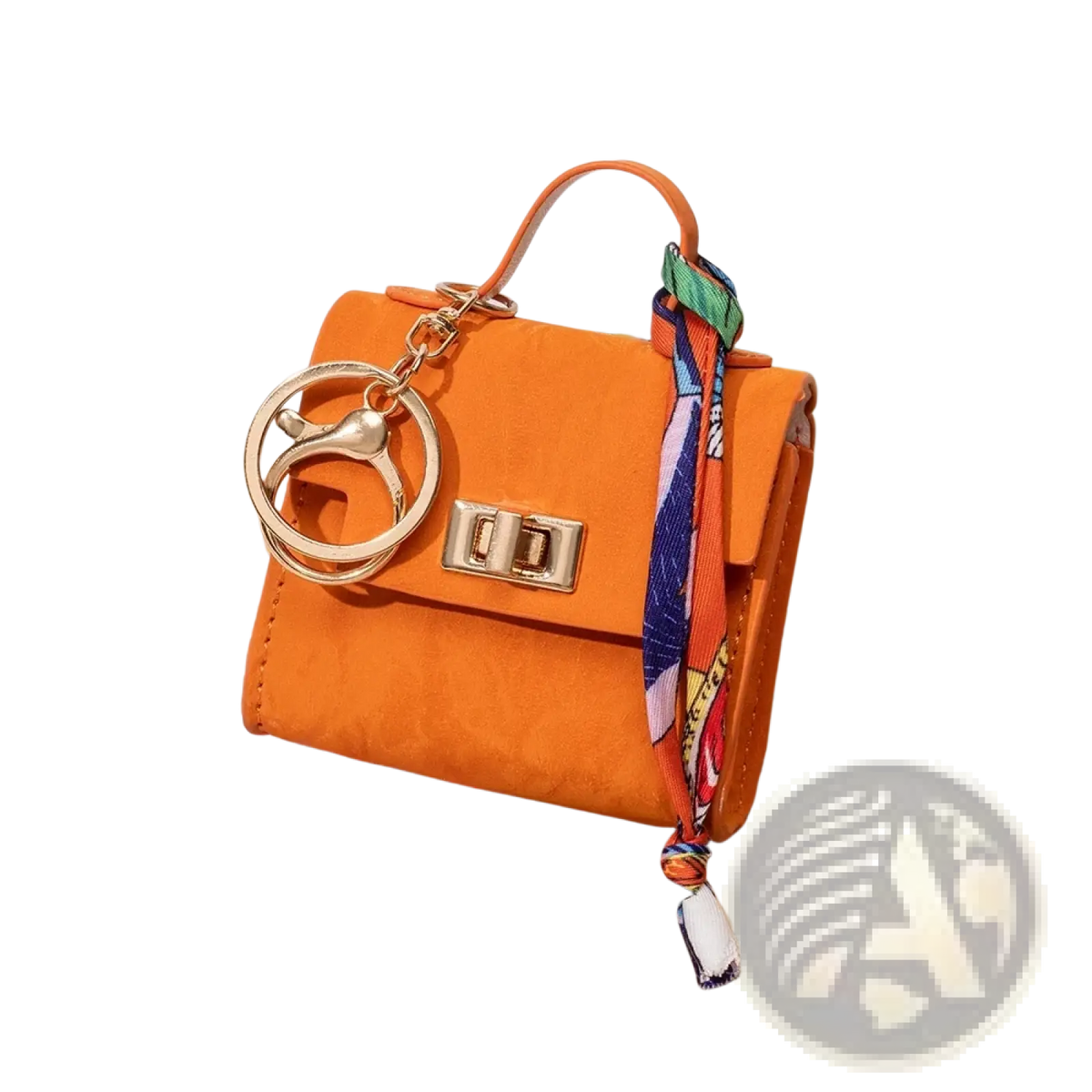 Miniature orange handbag keychain with gold-tone hardware and colorful patterned silk scarf strap