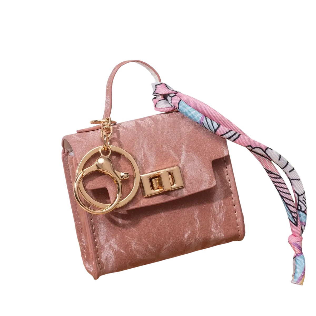 Miniature handbag keychain in pink faux leather with gold-tone hardware and a decorative silk scarf strap