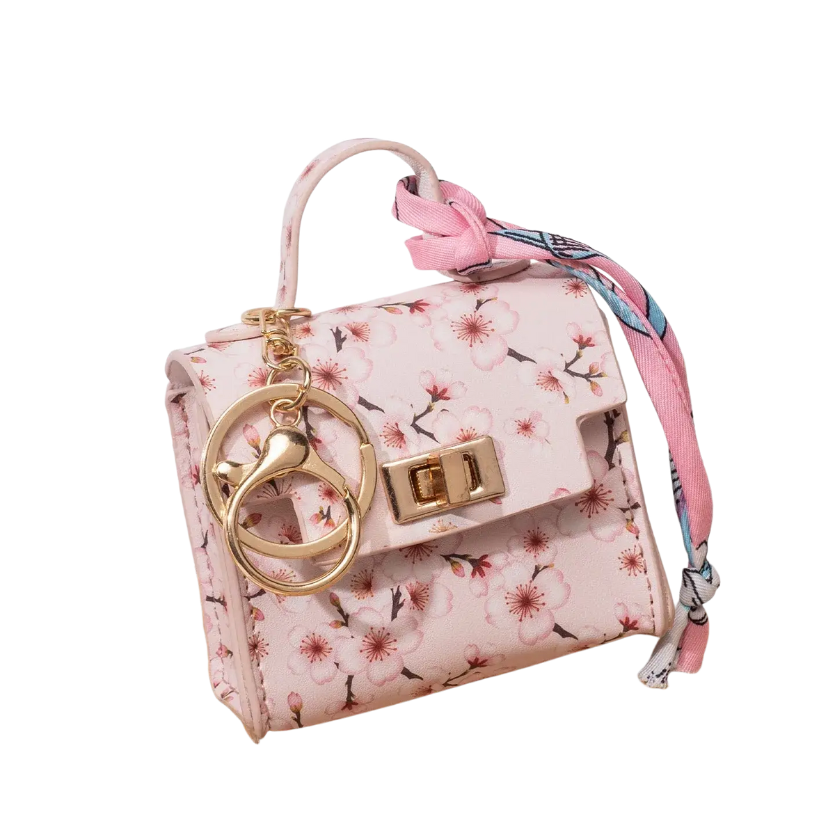 Miniature pink floral silk purse keychain with gold-tone hardware and matching pink ribbon for stylish accessory use