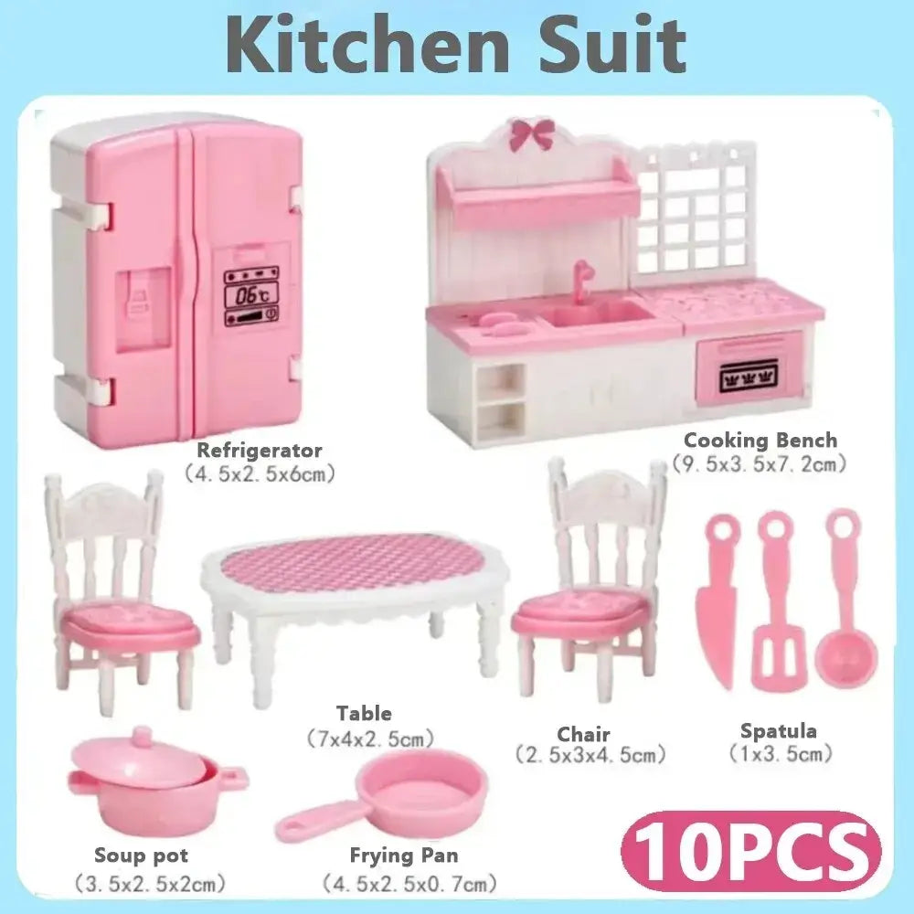 Miniature pink plastic dollhouse kitchen furniture set with white accents and small appliances for play use
