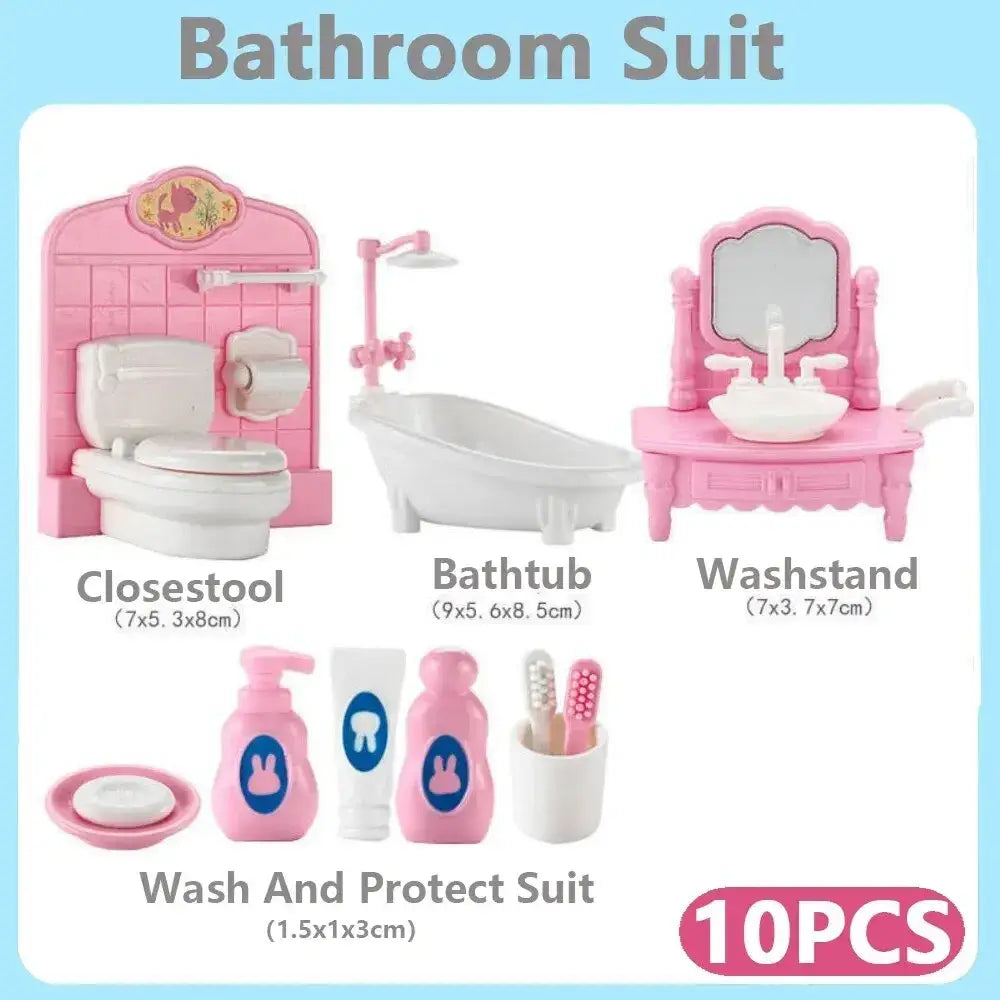 Miniature pink dollhouse kitchen furniture set featuring pink plastic bathroom toys with white fixtures and accessories