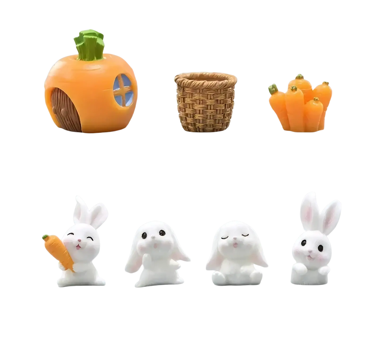 Miniature resin rabbit figurine featuring an orange carrot-shaped house with green leafy top and brown door for fairy garden decor