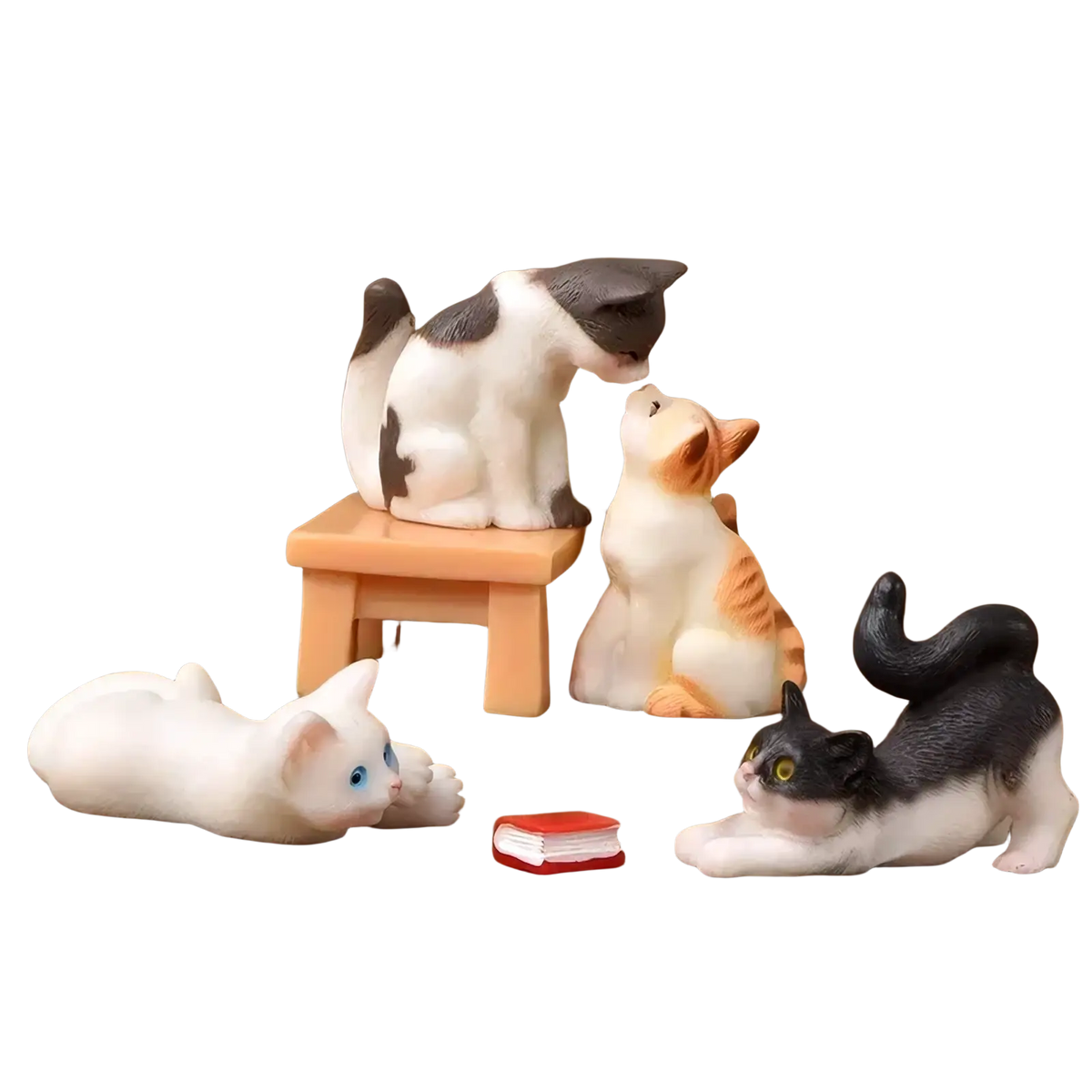 Miniature resin cat figurines in various colors including white blue eyes black and white and orange tabby for garden decor