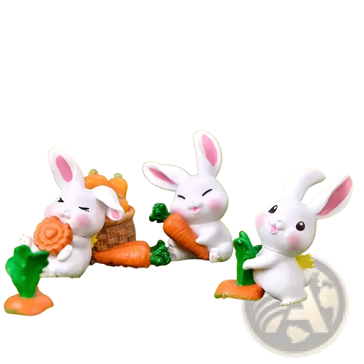 Three white resin miniature rabbit figurines with pink ears and cheeks holding orange carrots on green moss for fairy garden decor