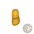 A bright yellow miniature crocs clog charm with classic perforated design and molded rubber sole for totes