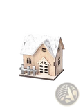 A rustic wooden miniature Christmas house with snow-dusted roof and gray picket fence base with lights