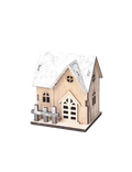 A rustic miniature wooden Christmas house with snow-dusted roof and gray picket fence made from light wood with lights