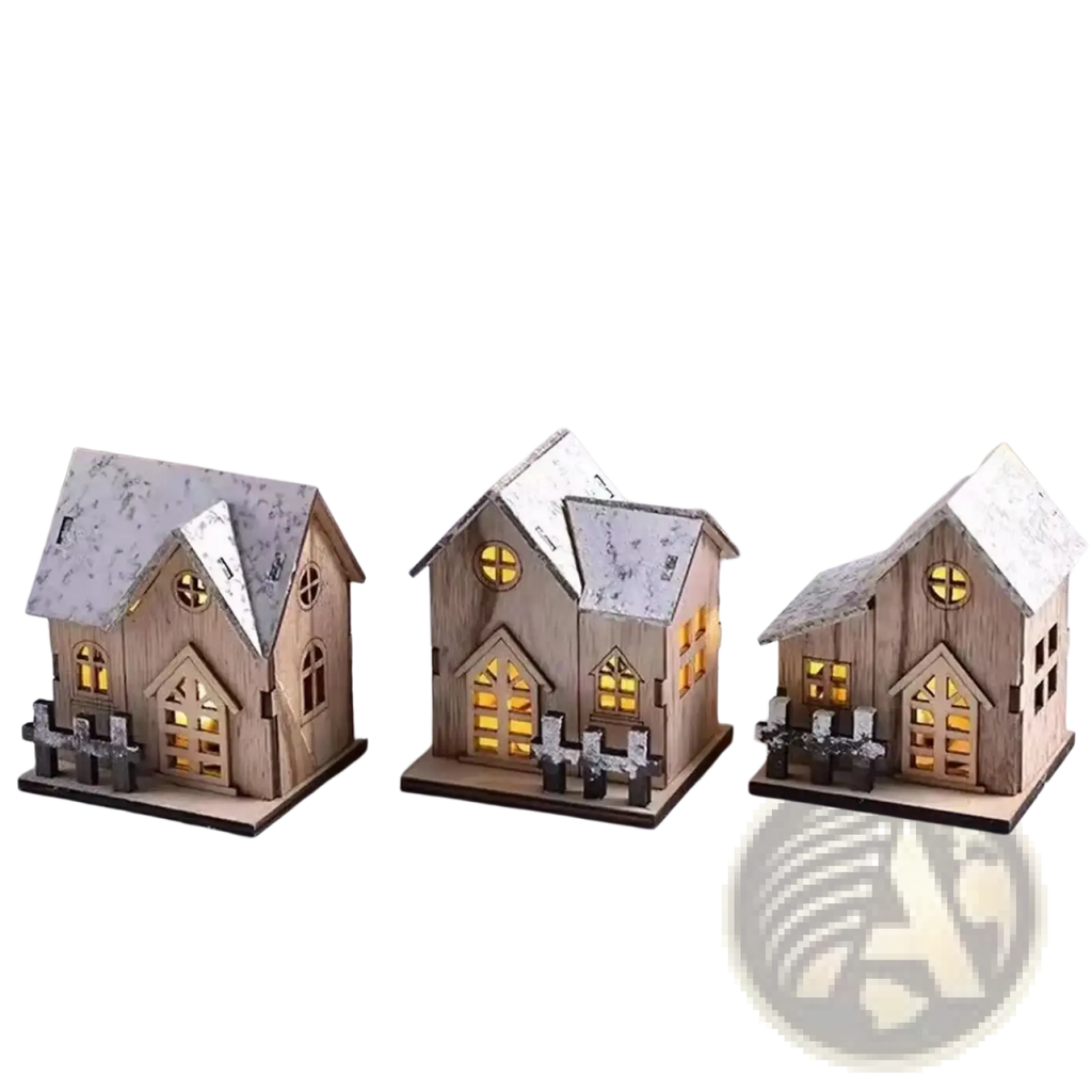Three miniature wooden Christmas houses with snow-dusted roofs and glowing yellow lights inside
