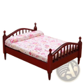 Miniature red wooden dollhouse bed with floral-patterned bedding for detailed dollhouse decor