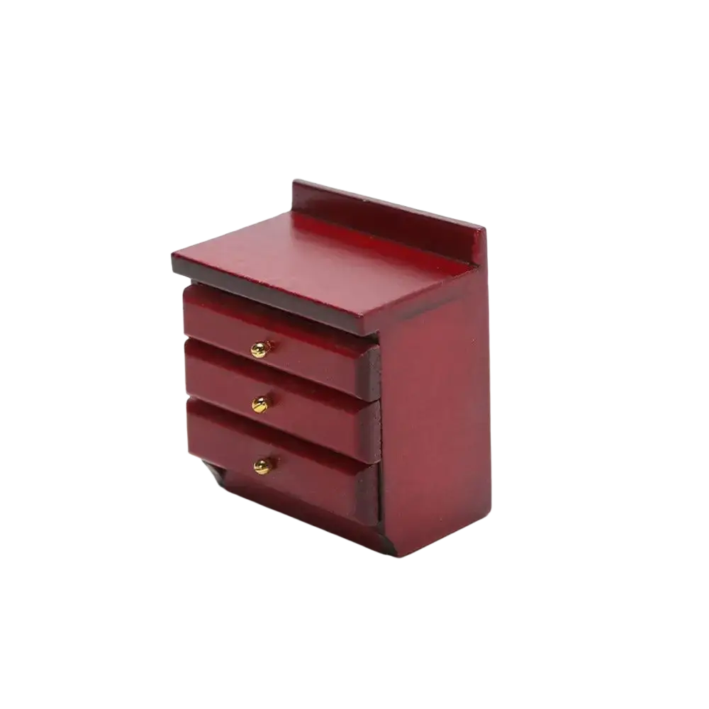 Red miniature wooden dresser with three drawers and gold-colored round knobs for dollhouse furniture use
