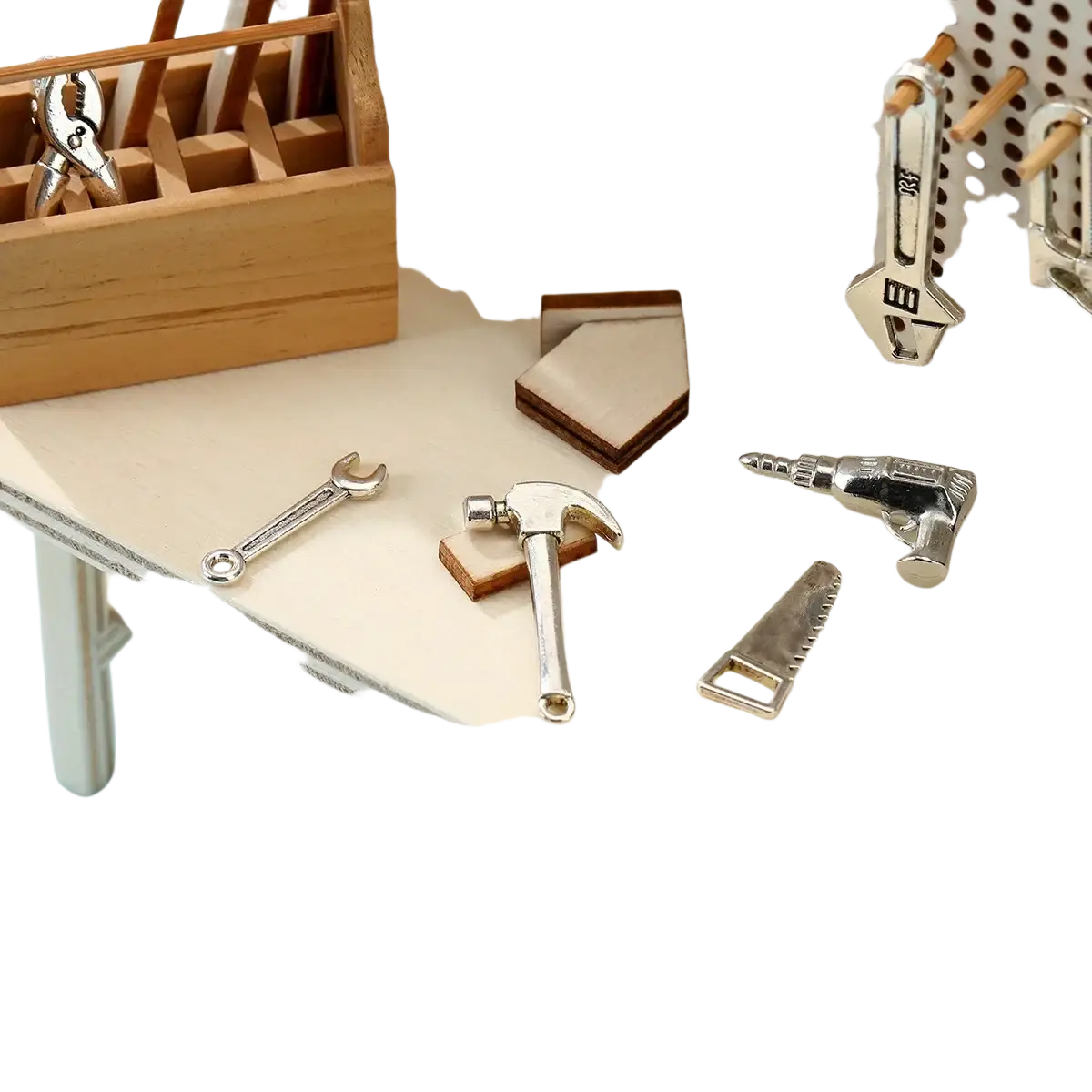 Silver miniature hammer with polished metallic finish and wooden base from miniature wooden workbench tool set diy model kit