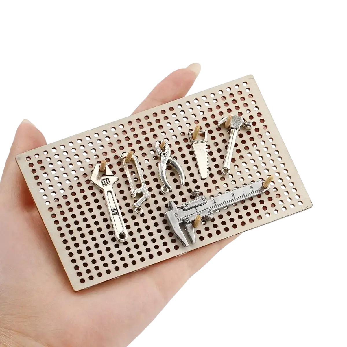 Silver-toned miniature wooden workbench tool set diy model kit displayed on perforated metal board background