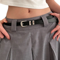 Minimalist black pu leather belt with silver buckle and two rectangular metal plates for a sleek finish