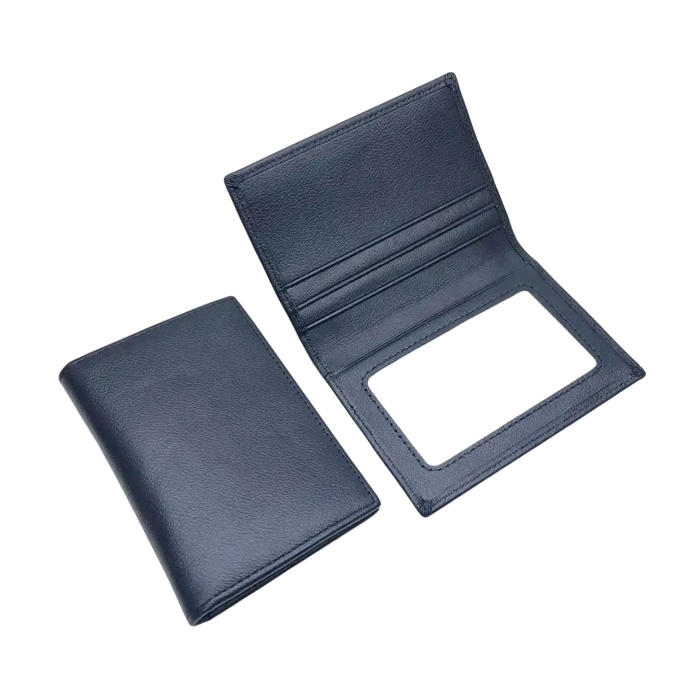 Dark blue minimalist leather card holder with clear ID window and multiple slots for slim wallet organization