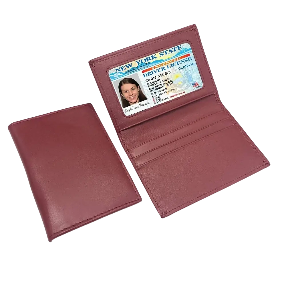 Minimalist leather card holder slim wallet in maroon with multiple card slots and clear id window holding new york license