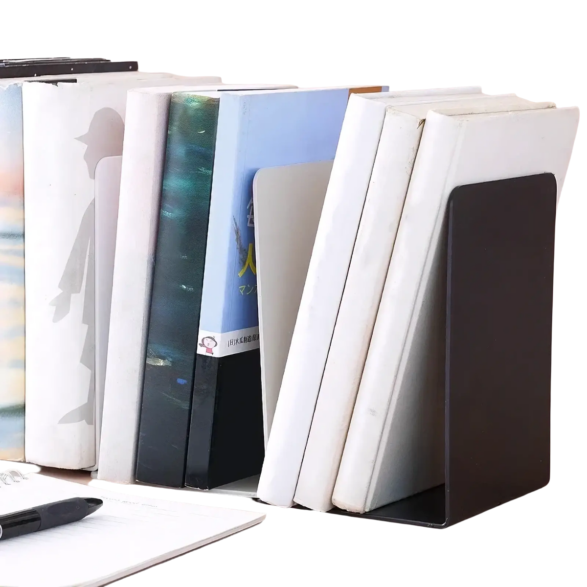 Black metal minimalist L shaped bookend holding a stack of books upright on a desktop