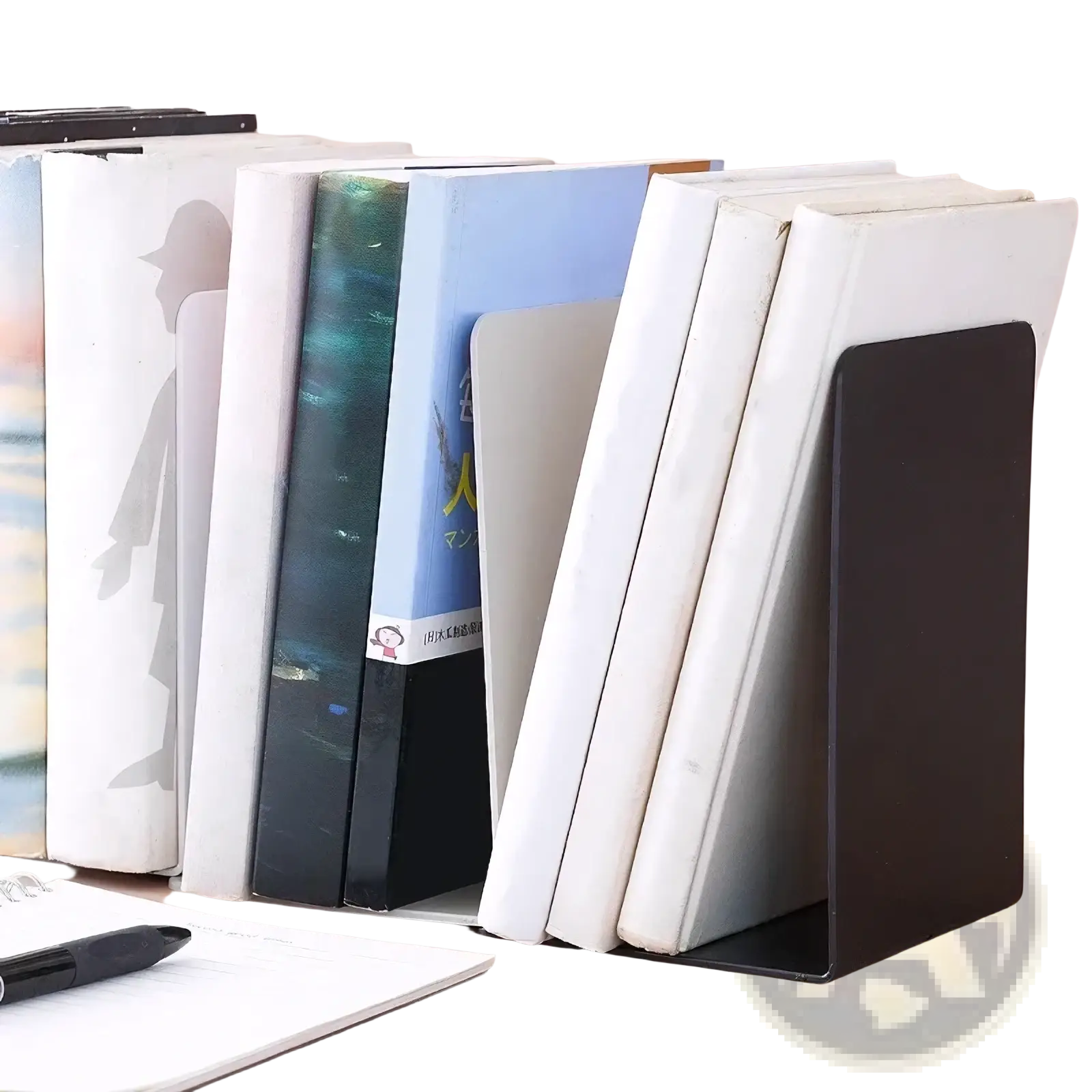 Black metal minimalist L shaped bookend holding a stack of books upright on a desktop