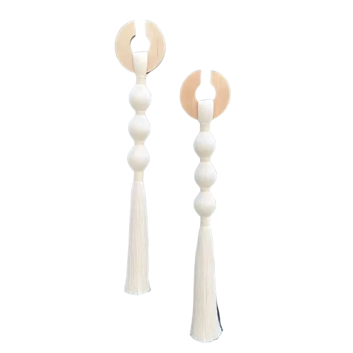 Pair of minimalist wooden wall hooks with cream-colored woven beaded stems and matching tassels for decorative hanging