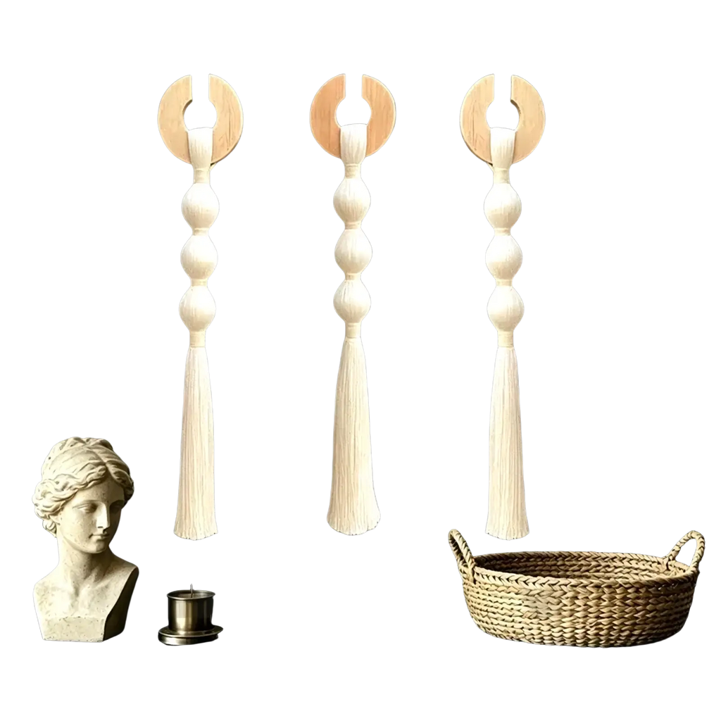 Minimalist woven tassel wall hanging art featuring three off-white handcrafted woven pieces with wooden circular tops and cascading beads