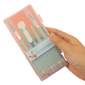 A clear plastic mint craft knife set and tool kit case with a fox and cactus design holding mint green tools