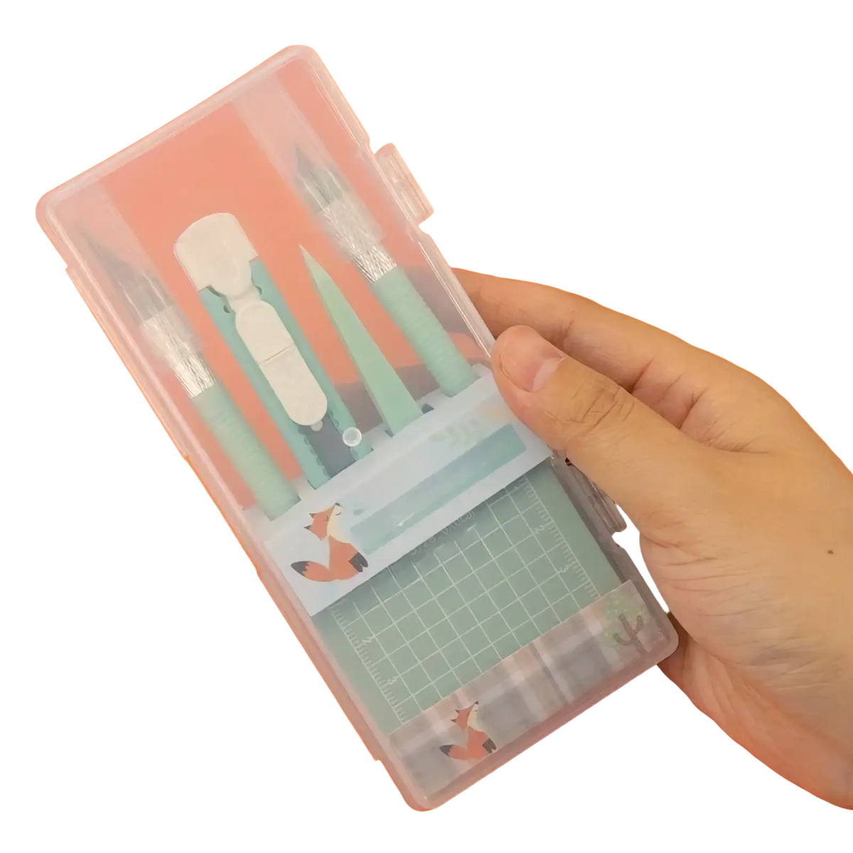 A clear plastic mint craft knife set and tool kit case with a fox and cactus design holding mint green tools