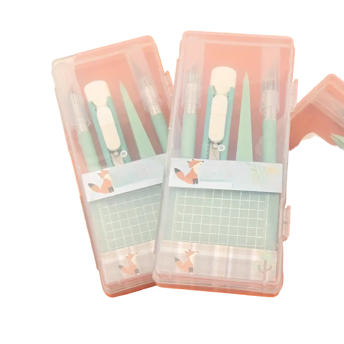 Mint craft knife set and tool kit with pastel mint green and white geometric drafting tools in clear plastic case with fox stickers
