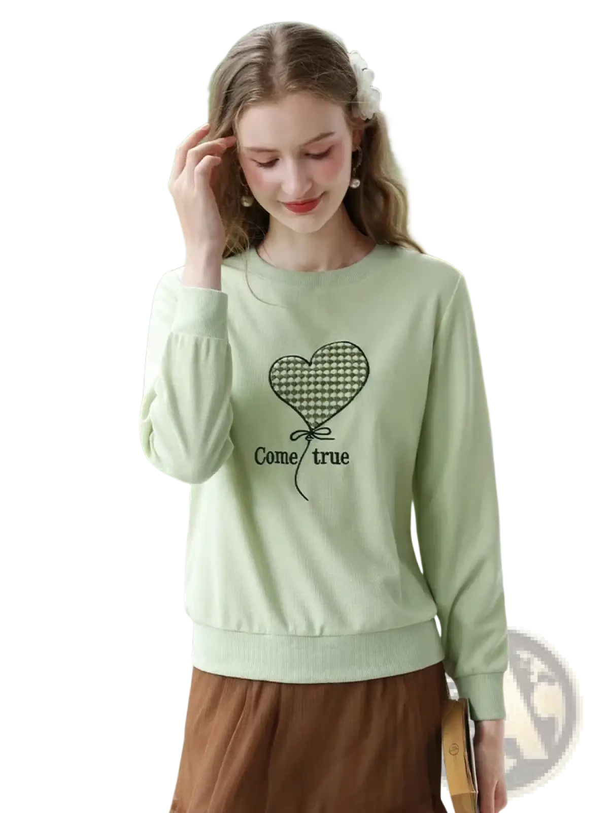 Mint green long-sleeved sweatshirt with embroidered black heart balloon graphic and come true text on front