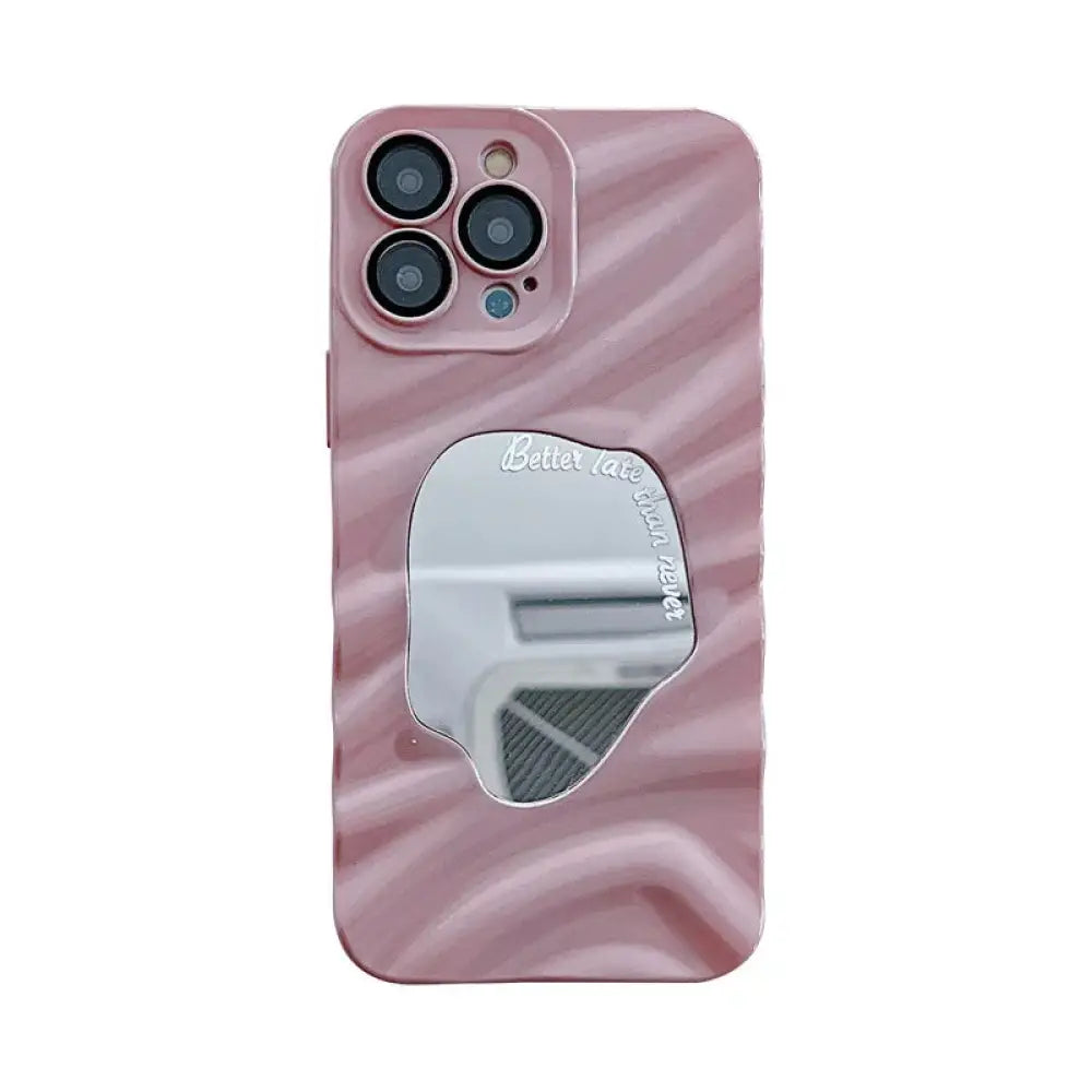 Back of a pink zebra-striped mirror water ripple reflective case for iPhone 14 Pro Max with white cursive text better late than never