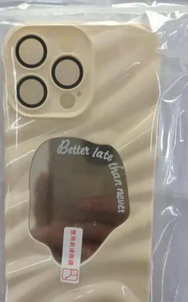Beige mirror water ripple reflective case for iphone 14 pro max showing back side with black camera cutout and guitar pick sticker