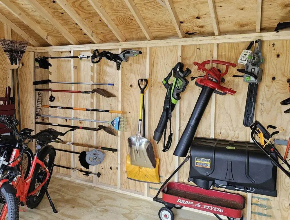 Red and black radio flyer wagon with white wheels shown with heavy duty compact stud mounted power tool storage hook