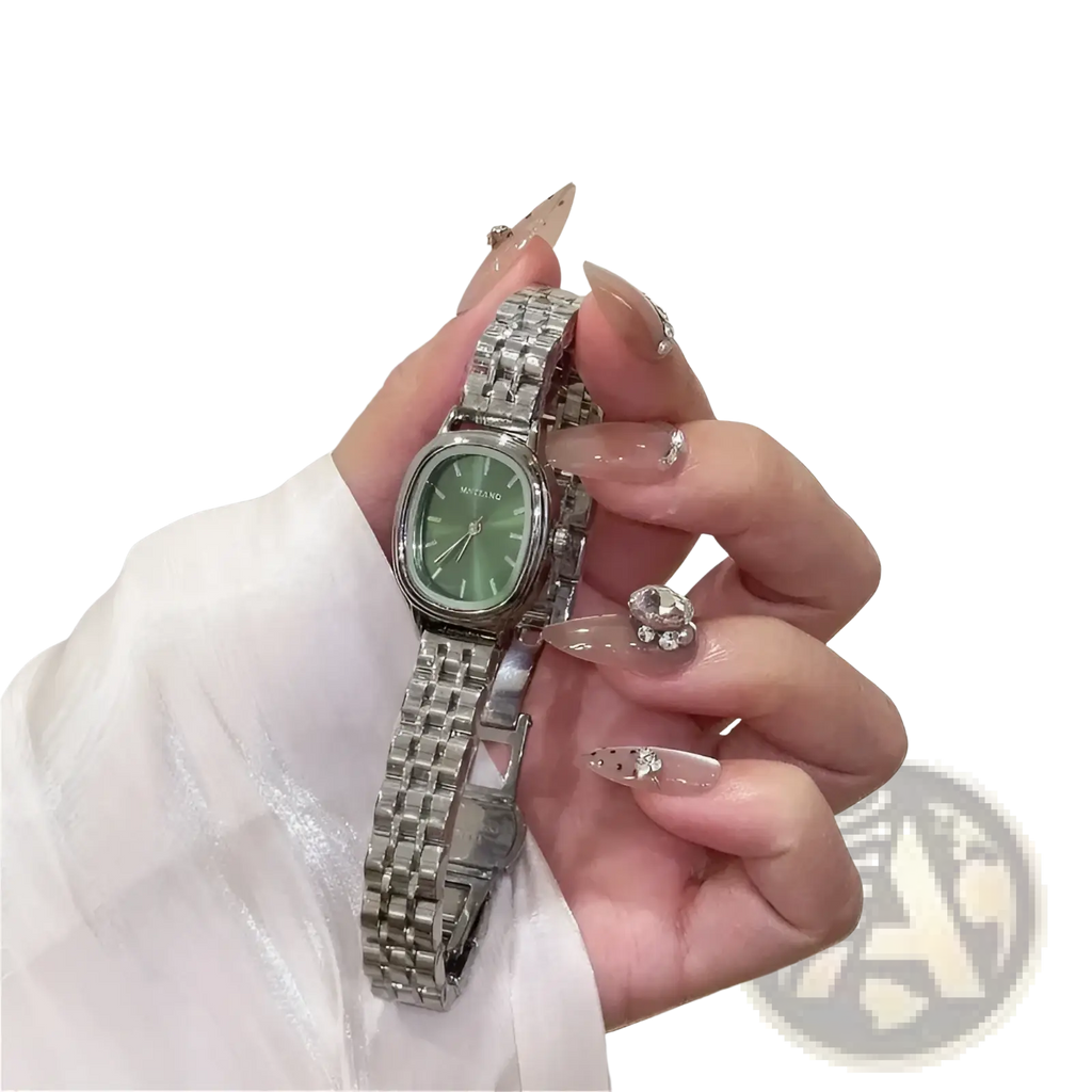 Silver-toned minimalist Mistian Oval Quartz Watch for women with a rectangular green dial and linked metal bracelet