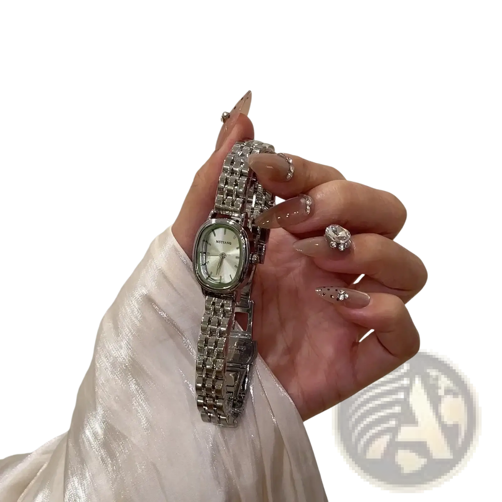 Silver metallic Mistian Oval Quartz watch for women with a rectangular face linked bracelet and mitsu brand dial