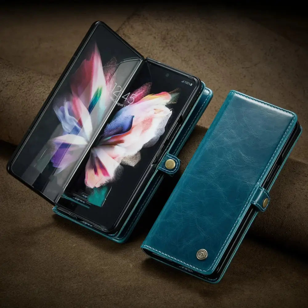 Teal leather wallet-style case for a foldable smartphone designed as an ergonomic anti fatigue game console handle grip