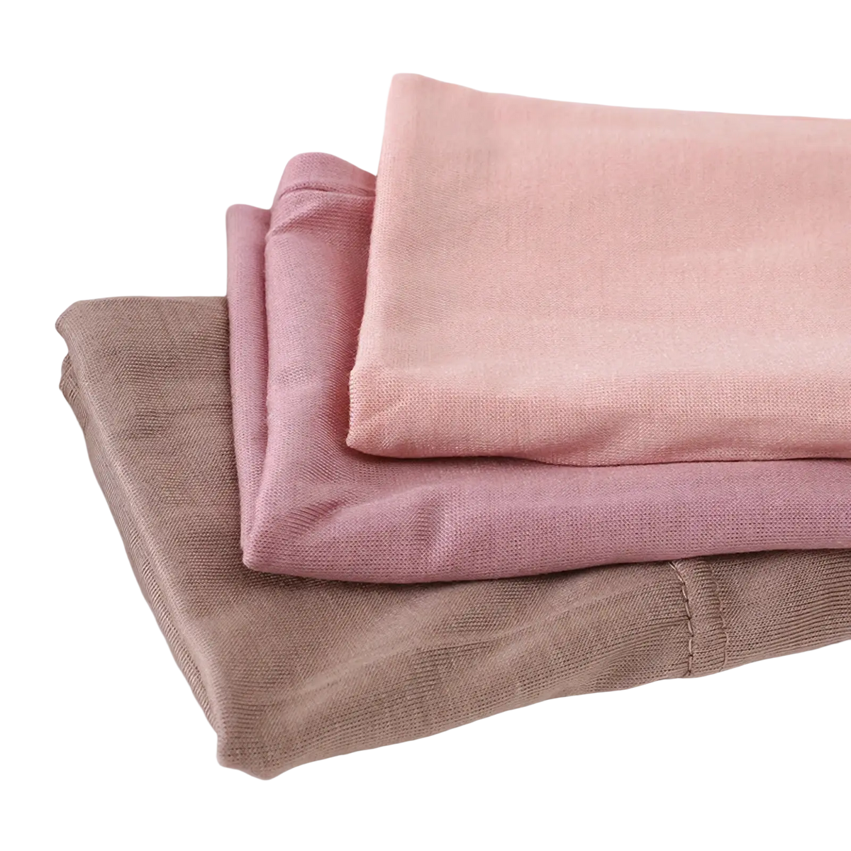 Three neatly stacked soft pastel modal cotton knit leggings in dusty rose blush pink and taupe for muslim hijab underscarf cap